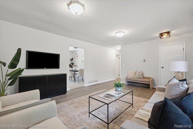 22281 Poinciana St, Southfield, MI 48033 - living area featuring wood finished floors and baseboards