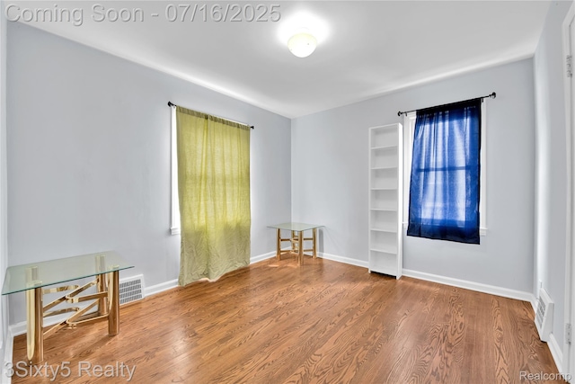 2133 Bailey St, Dearborn, MI 48124 - unfurnished room with wood finished floors and baseboards