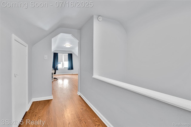 2133 Bailey St, Dearborn, MI 48124 - corridor featuring wood finished floors and vaulted ceiling