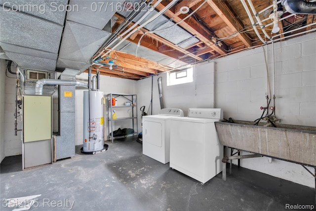 2133 Bailey St, Dearborn, MI 48124 - below grade area featuring gas water heater, washer and clothes dryer, and heating unit