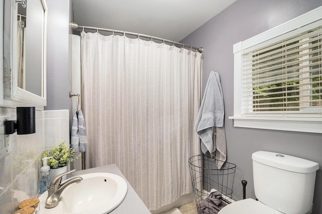 407 W Pine St, Big Rapids, MI 49307 - bathroom featuring a sink and a shower with shower curtain