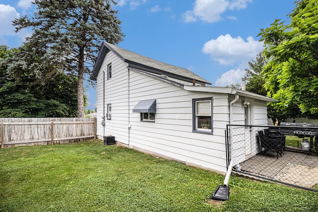 407 W Pine St, Big Rapids, MI 49307 - view of side of property with roof with shingles