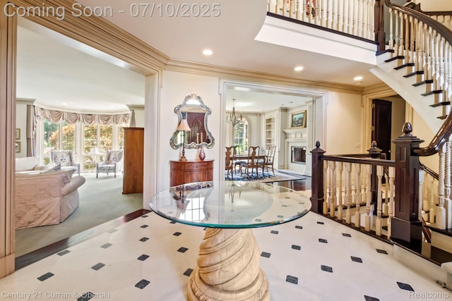 18878 Oak Leaf Ln, Northville, MI 48168 - foyer entrance featuring recessed lighting, ornamental molding, plenty of natural light, and stairs