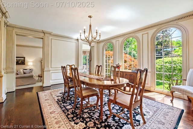 18878 Oak Leaf Ln, Northville, MI 48168 - dining area with a decorative wall, a chandelier, dark wood-type flooring, and crown molding