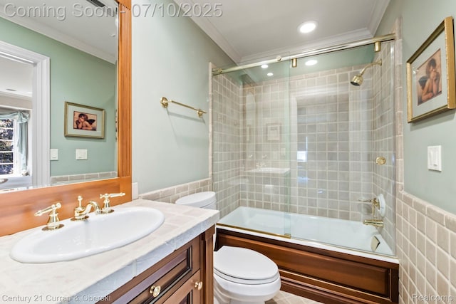18878 Oak Leaf Ln, Northville, MI 48168 - full bath with tile walls, crown molding, vanity, wainscoting, and shower / bath combination with glass door