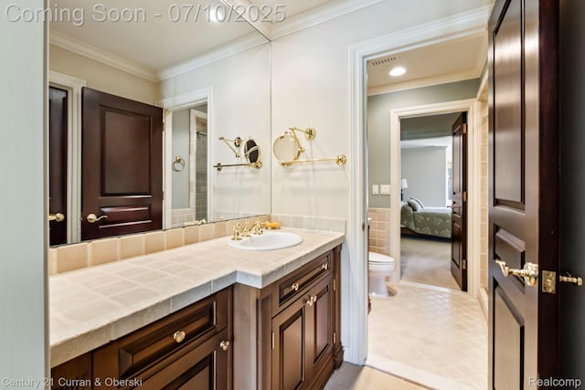 18878 Oak Leaf Ln, Northville, MI 48168 - ensuite bathroom with vanity, tile patterned flooring, and crown molding