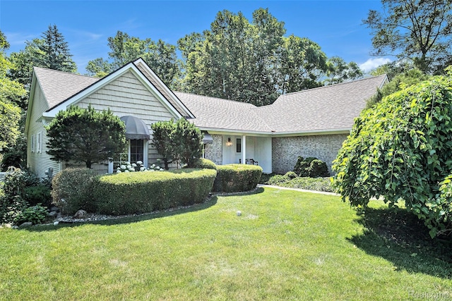 2032 Crestline, Burton, MI 48509 - ranch-style house with a front yard and a shingled roof