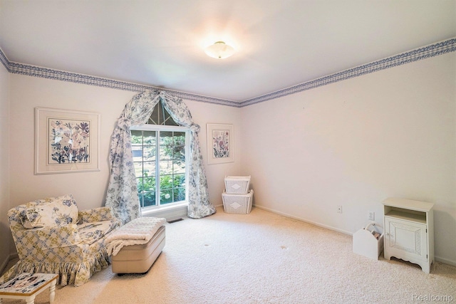 2032 Crestline, Burton, MI 48509 - sitting room with carpet floors and crown molding