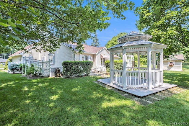 2032 Crestline, Burton, MI 48509 - rear view of property with a gazebo and a lawn