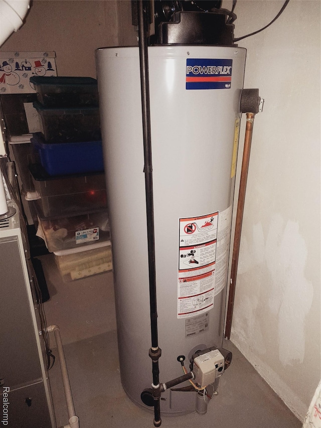 2032 Crestline, Burton, MI 48509 - utility room featuring water heater