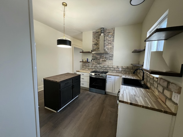 717 Watson St SW, Grand Rapids, MI 49504 - kitchen featuring open shelves, gas range, butcher block counters, and dark wood-style flooring