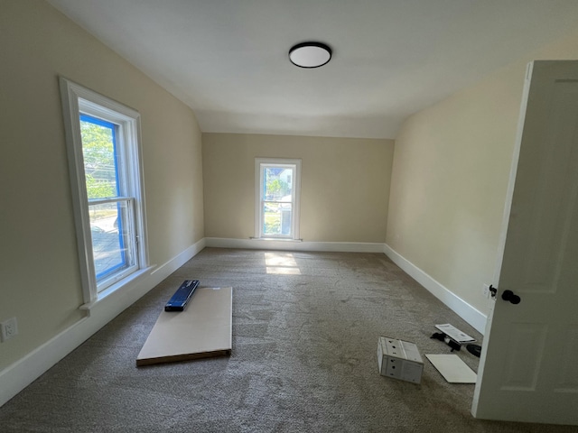 717 Watson St SW, Grand Rapids, MI 49504 - carpeted spare room featuring plenty of natural light