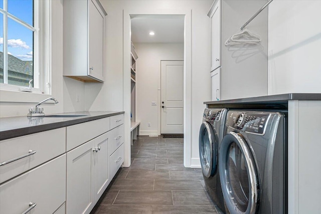 273 Waters Edge Dr, Saint Joseph, MI 49085 - laundry room featuring separate washer and dryer, cabinet space, and recessed lighting
