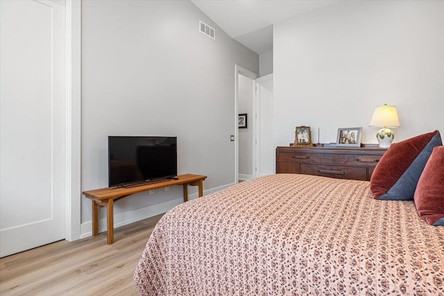 273 Waters Edge Dr, Saint Joseph, MI 49085 - bedroom with light wood-style flooring and baseboards