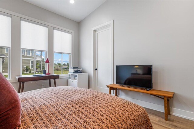 273 Waters Edge Dr, Saint Joseph, MI 49085 - bedroom with wood finished floors and recessed lighting