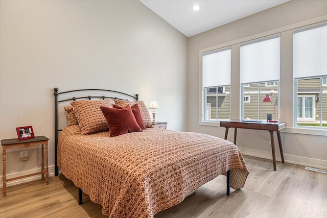 273 Waters Edge Dr, Saint Joseph, MI 49085 - bedroom featuring light wood finished floors, recessed lighting, and vaulted ceiling