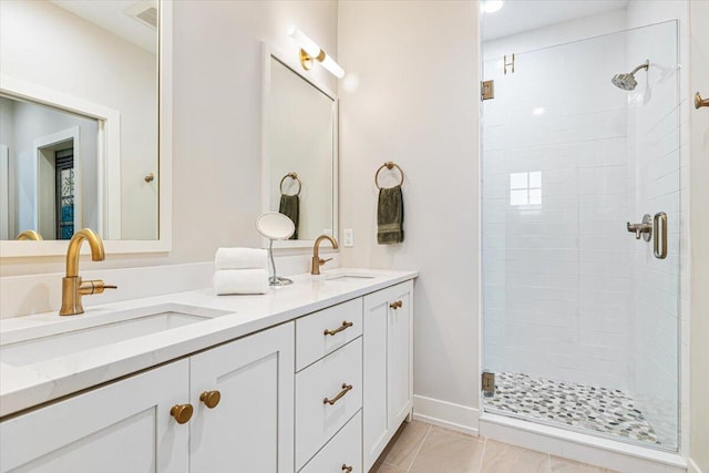 273 Waters Edge Dr, Saint Joseph, MI 49085 - full bath with a stall shower, double vanity, and tile patterned floors