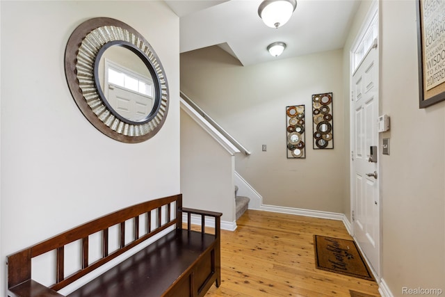 750 2nd St Unit 27, Wyandotte, MI 48192 - foyer with light wood-style floors and stairs