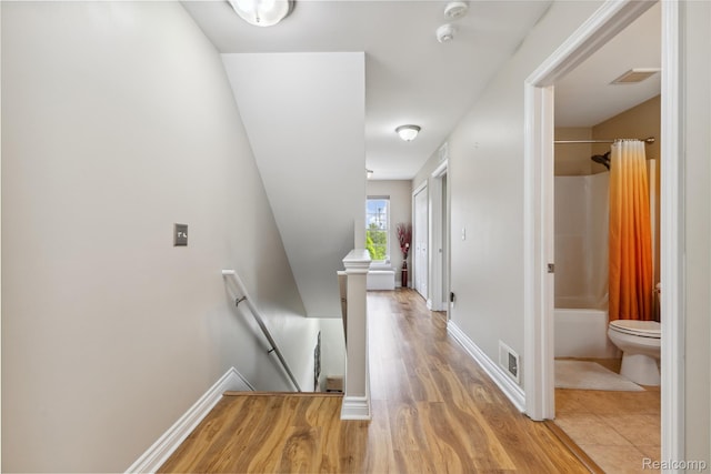 750 2nd St Unit 27, Wyandotte, MI 48192 - hall with an upstairs landing and light wood-type flooring