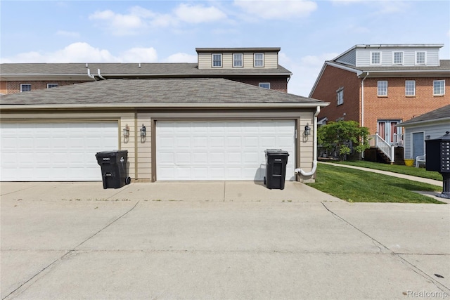 750 2nd St Unit 27, Wyandotte, MI 48192 - garage with concrete driveway
