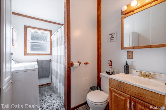 6123 Lapeer Rd, Burton, MI 48509 - full bathroom with washer / dryer, vanity, a bathtub, wood finished floors, and a shower with shower curtain