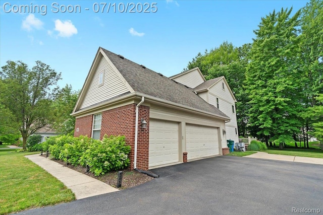 4583 Racewood Dr, Commerce Twp, MI 48382 - view of side of home featuring brick siding, an attached garage, a shingled roof, and driveway