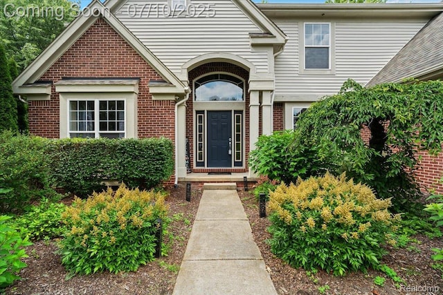 4583 Racewood Dr, Commerce Twp, MI 48382 - entrance to property featuring brick siding