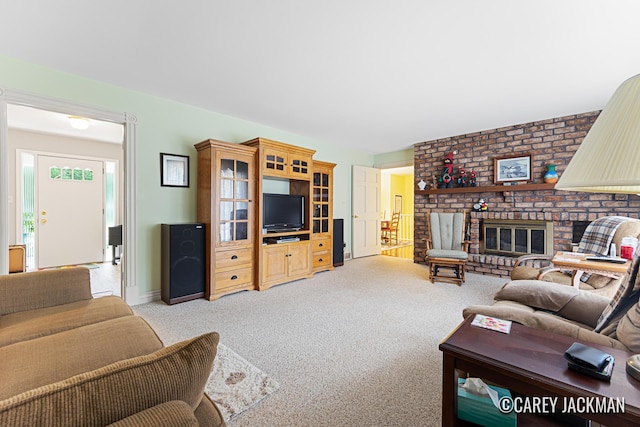 3910 Walker Ave NW, Grand Rapids, MI 49544 - living room featuring light colored carpet and a fireplace