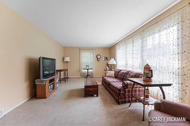 3910 Walker Ave NW, Grand Rapids, MI 49544 - carpeted living room with baseboards
