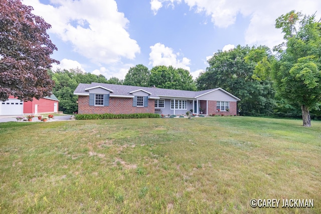 3910 Walker Ave NW, Grand Rapids, MI 49544 - single story home featuring brick siding and a front lawn