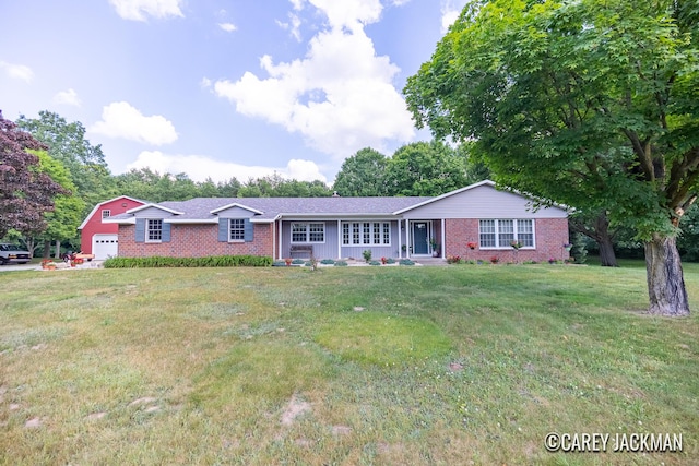 3910 Walker Ave NW, Grand Rapids, MI 49544 - single story home with brick siding, a front lawn, and a garage