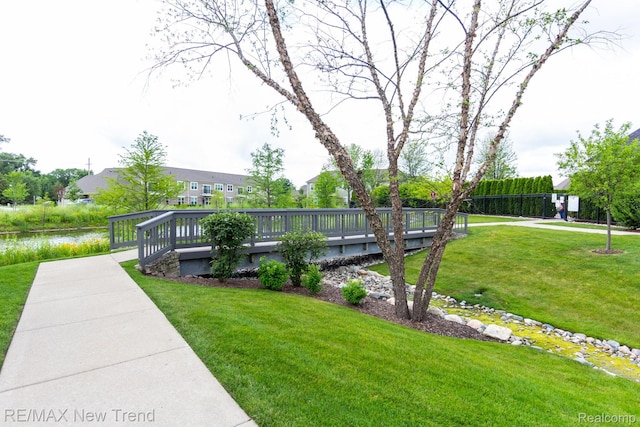 45929 Graystone Ln, Canton, MI 48187 - view of green lawn with a deck