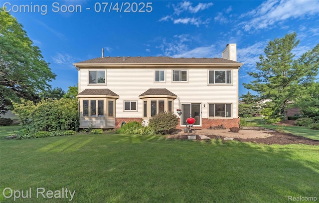 3830 Kossuth Rd, Lake Orion, MI 48360 - back of property featuring a chimney, a lawn, and brick siding