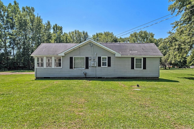 1982 Mckinley St, Kalamazoo, MI 49004 - ranch-style house with crawl space, a front lawn, and a shingled roof