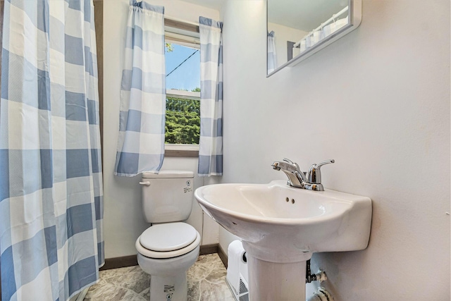 1982 Mckinley St, Kalamazoo, MI 49004 - full bathroom featuring toilet and a shower with shower curtain