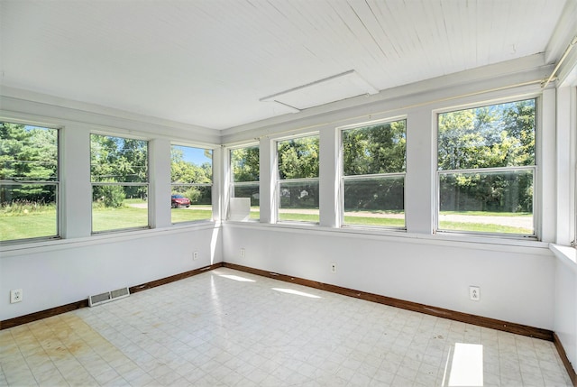 1982 Mckinley St, Kalamazoo, MI 49004 - unfurnished sunroom featuring healthy amount of natural light and tile patterned floors