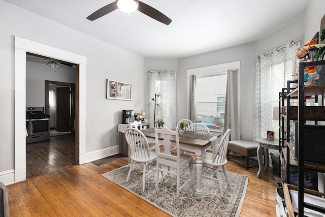 1607 Center Ave NE, Grand Rapids, MI 49505 - dining space with ceiling fan, healthy amount of natural light, and light wood-style flooring