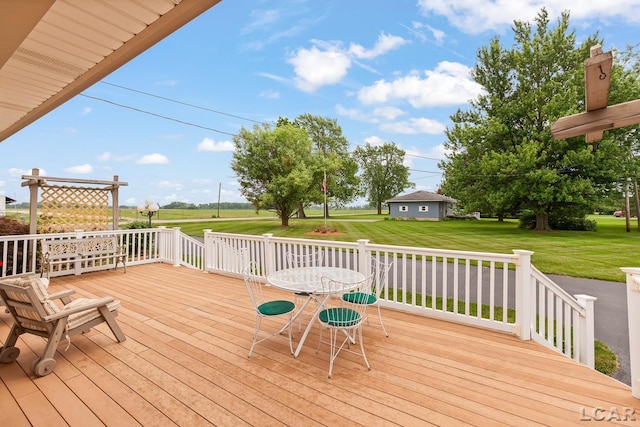 3224 Sand Creek Highway, Adrian, MI 49221 - wooden deck with a yard and outdoor dining space