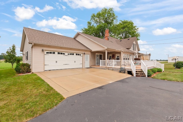 3224 Sand Creek Highway, Adrian, MI 49221 - view of front of home featuring a garage, concrete driveway, a front lawn, a shingled roof, and a chimney