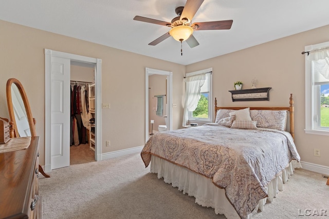 3224 Sand Creek Highway, Adrian, MI 49221 - bedroom featuring a spacious closet, light colored carpet, multiple windows, and a closet