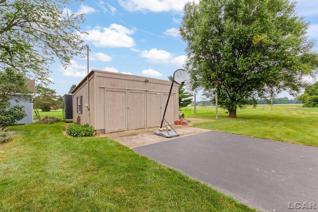 3224 Sand Creek Highway, Adrian, MI 49221 - view of grassy yard with a storage shed