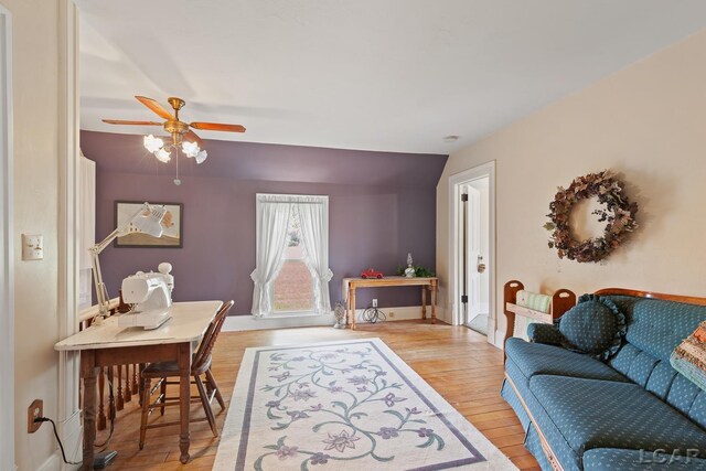 3224 Sand Creek Highway, Adrian, MI 49221 - living area featuring light wood-style flooring and ceiling fan