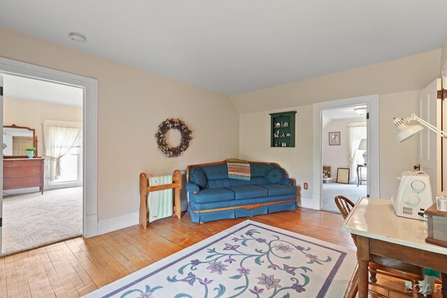 3224 Sand Creek Highway, Adrian, MI 49221 - living area with wood finished floors and baseboards