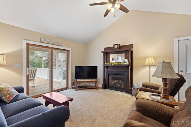 3224 Sand Creek Highway, Adrian, MI 49221 - living room with a glass covered fireplace, carpet floors, a ceiling fan, and high vaulted ceiling