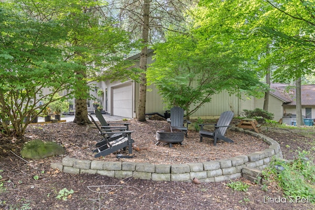 6636 E Riverwoods Ct NE, Rockford, MI 49341 - view of yard with a garage
