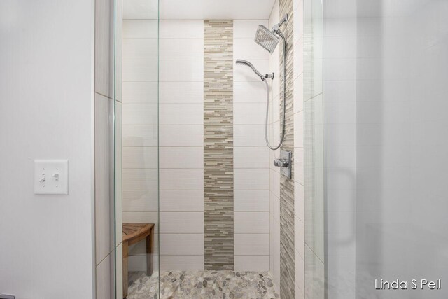 6636 E Riverwoods Ct NE, Rockford, MI 49341 - full bathroom featuring a stall shower