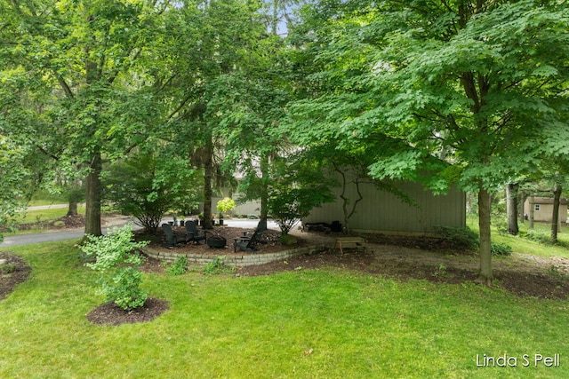 6636 E Riverwoods Ct NE, Rockford, MI 49341 - view of grassy yard