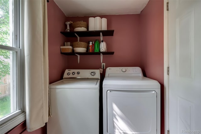 1217 E Madge Ave, Hazel Park, MI 48030 - laundry room featuring washer and clothes dryer and plenty of natural light