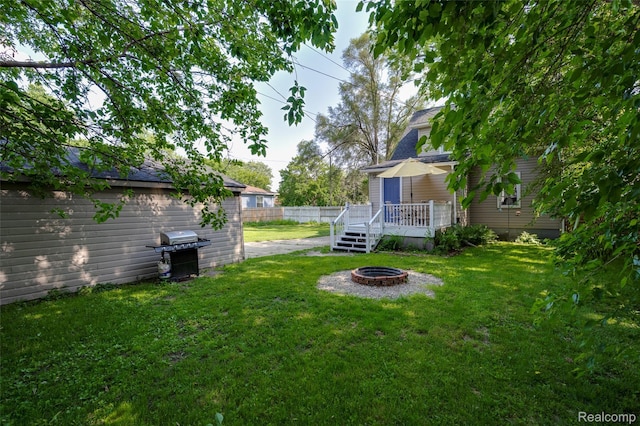 1217 E Madge Ave, Hazel Park, MI 48030 - view of yard featuring a fire pit and a deck