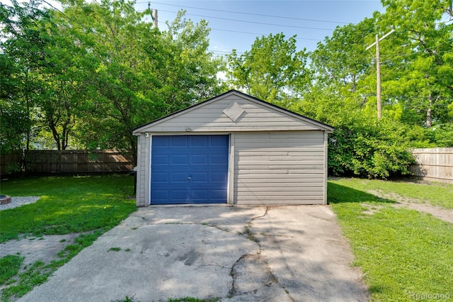 1217 E Madge Ave, Hazel Park, MI 48030 - detached garage featuring concrete driveway